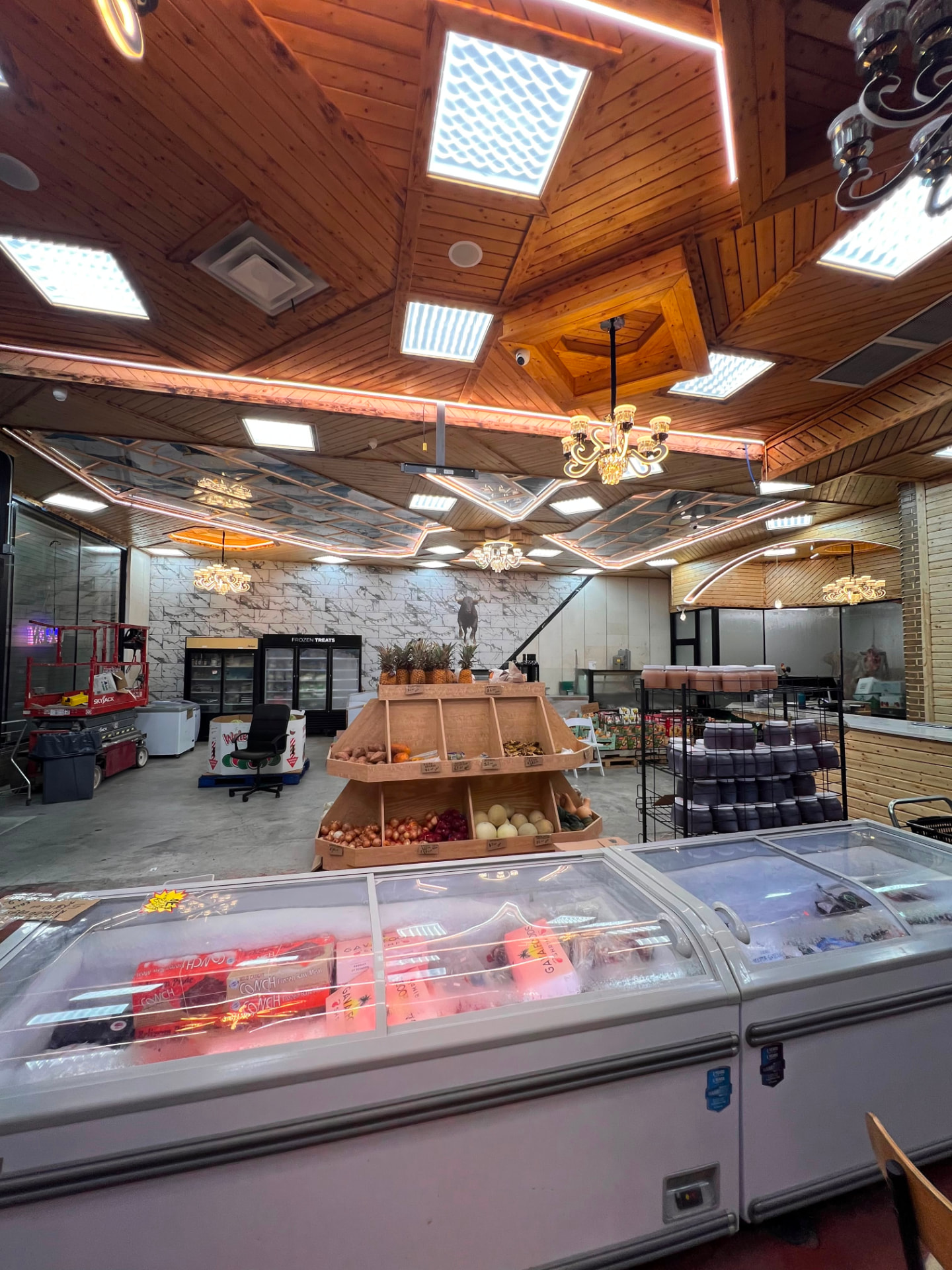 Main floor with fresh produce and frozen displays