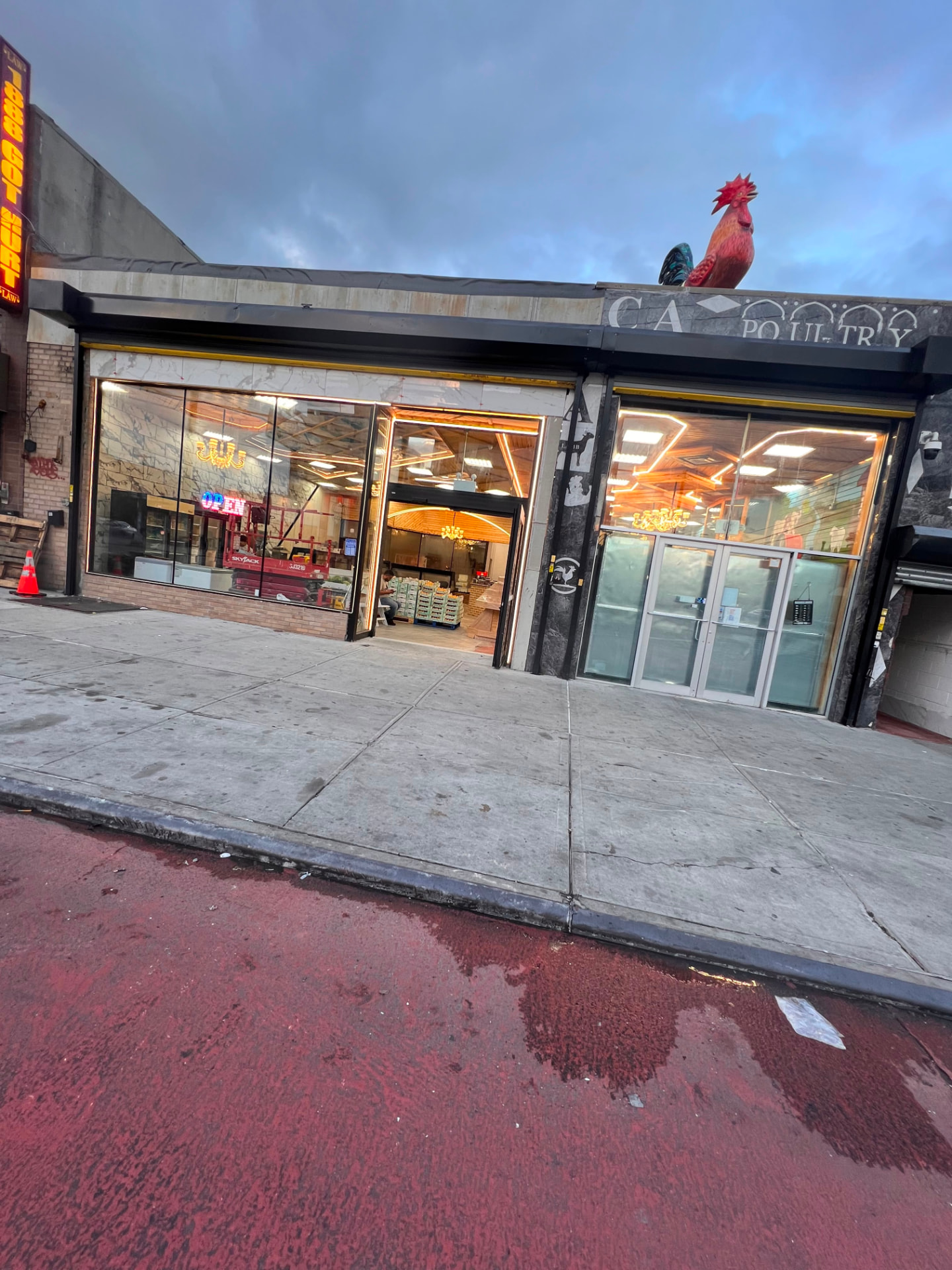 Our storefront on Utica Ave with the signature rooster